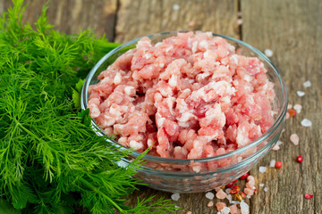minced meat on wooden table