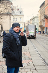 man talking on the phone in the winter