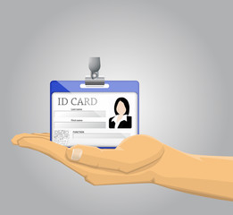 Hand holding an ID Card