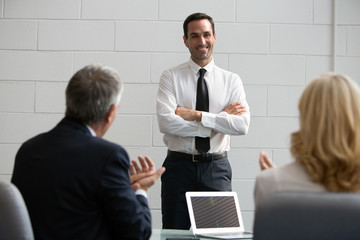 Fototapeta premium Three businesspeople during a meeting