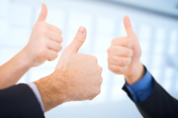 Businessmen Gesturing Thumbs up. Business Concept