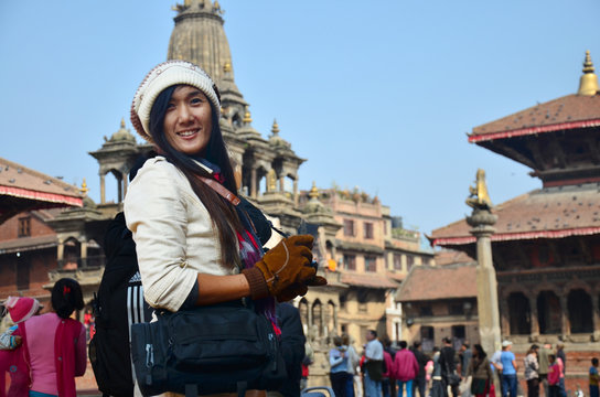 Traveler and Nepalese people come to Patan Durbar Square