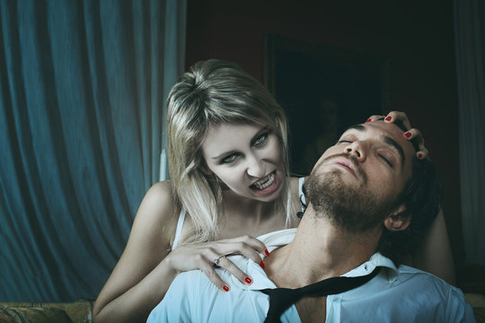 Beautiful female vampire and her prey
