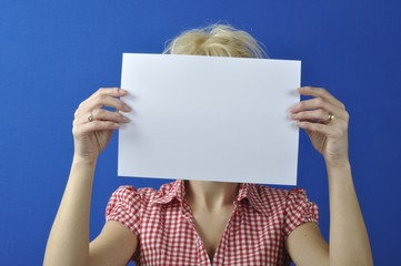 woman holding blank sign