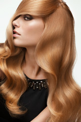 Blond hair. Portrait of beautiful Blonde with Long Wavy Hair. Hi