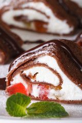 roll chocolate crepe with cheese and fruit macro. Vertical