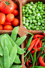 Fresh green peas, tomato and chili