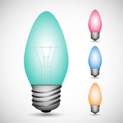 Set of colorful incandescent lamps on the gray background