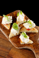 Spanish food tapas. Toasted bread with fresh cheese