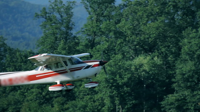 Close up of small airplane taking off