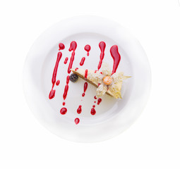 Almond cake (air meringue with a delicate cream and almonds unde