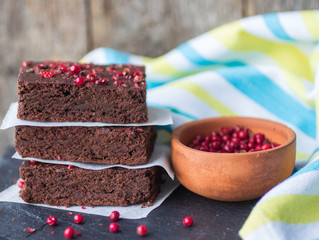chocolate and pink pepper brownie cakes.  shallow depth of field