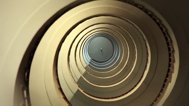 Camera zoom in and out of spiral staircase