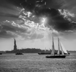 New York sailboat sunset and Statue of Liberty