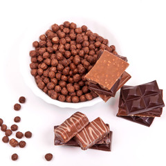 Chocolate chocolate balls and candy on a white background