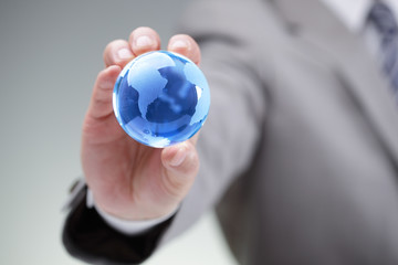 Businessman with the world in his hands