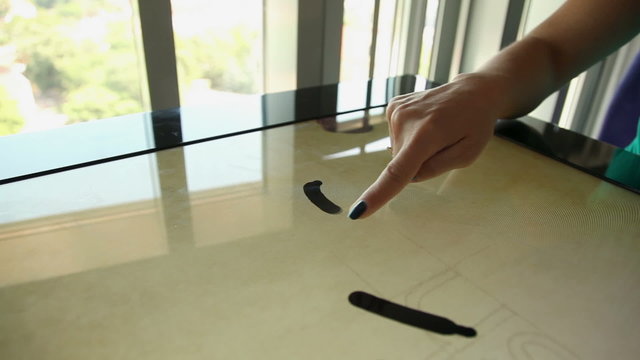 Playing with touch screen table while floor moving
