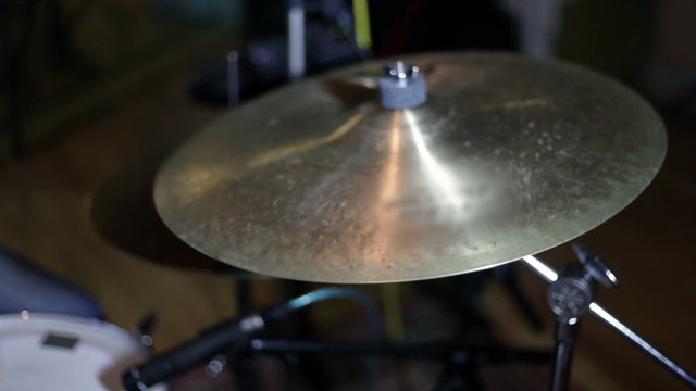 close up shot of musican playing drums