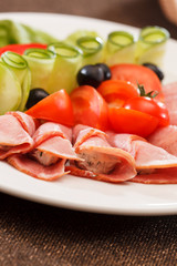 Meat appetizer with vegetables