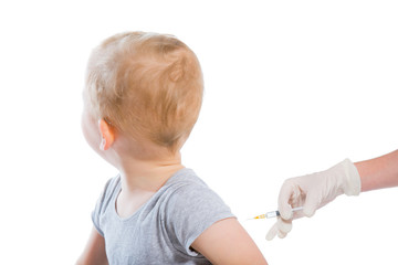 The doctor makes a baby vaccination on a white background.