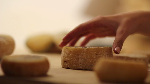 HD1080p: Close up of putting small cheeses together