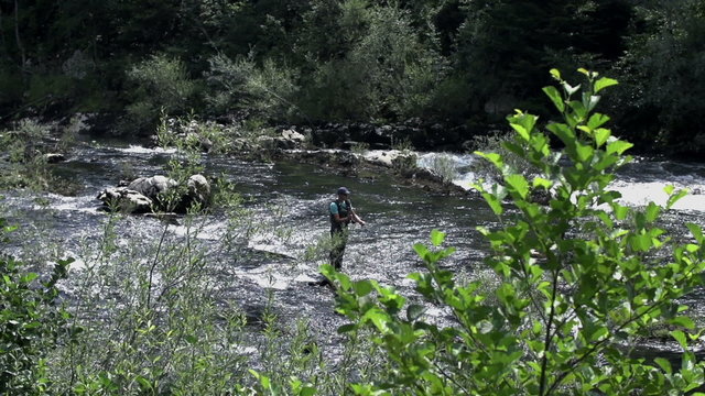 Fisherman fishing with fishing lure