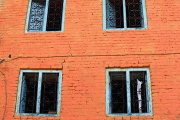 Blue windows-red brick facade-T.T.Yangtse-Namo Buddha-Npl. 1018