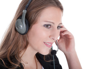 Frau mit Headset im Callcenter lächelt Nahaufnahme