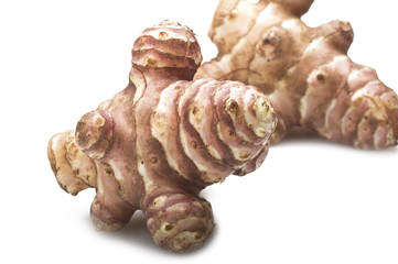 Jerusalem artichoke, topinambur close up on the white