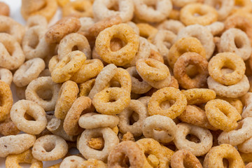 Closeup of a pile of round breakfast cereals