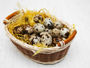 Quail eggs in basket