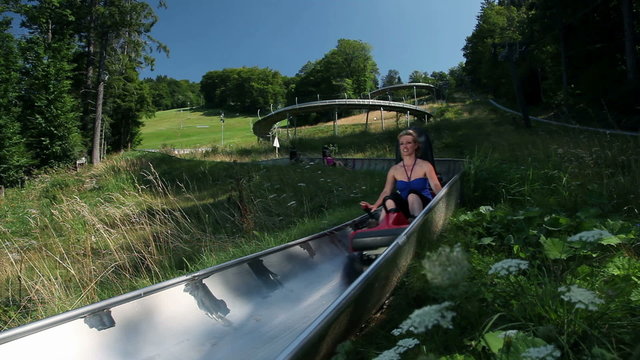 extreme sport activity with bobsled in the pure nature on a sunny day 
