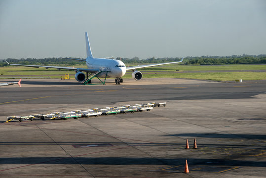 Aeroplane at airport and Cones on track. Ezeiza, Buenos Aires.