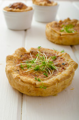 Onion mini quiche with bacon and corn