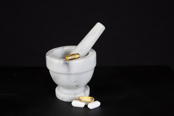 Mortar and pestle with pills
