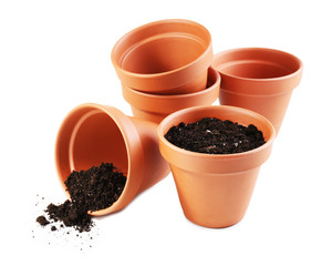 Clay flower pots and soil, isolated on white