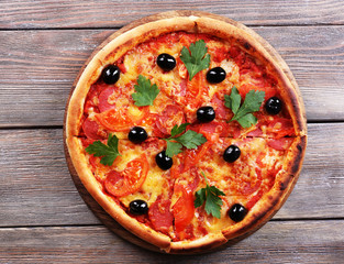 Delicious Italian pizza with black olives