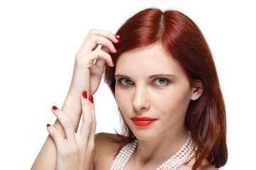 Portrait of beautiful red- haired woman.