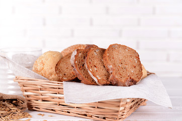 Tasty bread on table on light background