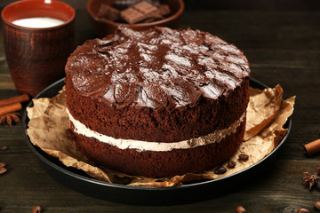 Delicious chocolate cake on table close-up