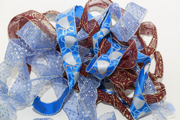 Closeup view of colorful decorative ribbons isolated on grey