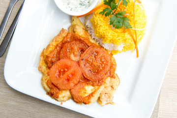 Poultry chop with tomatoes