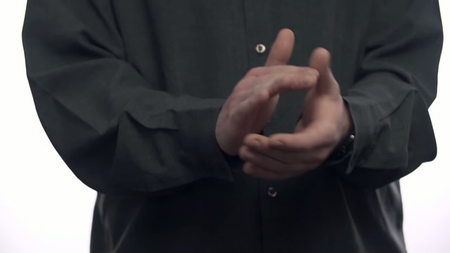 Person clapping in slow motion close up
