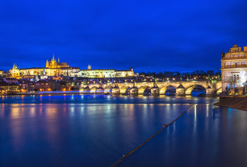 Fototapeta na wymiar Evening view of the Prague castle, Charles bridge and the Vltava
