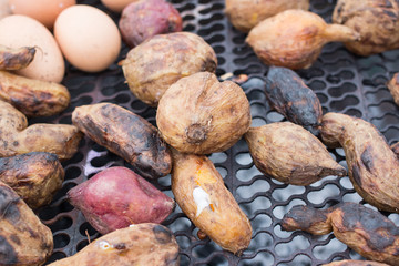 eggs and potato on the grill