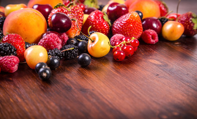 fresh berries on wooden table