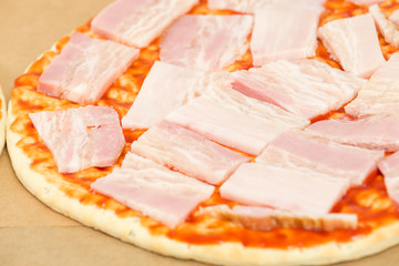 slices of bacon on pizza