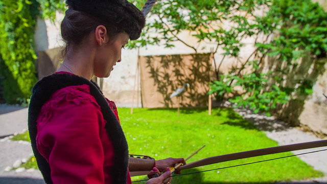 Turkish princess training shooting with bow
