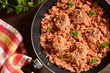 meat balls with rice and tomatoes