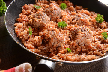 meat balls with rice and tomatoes